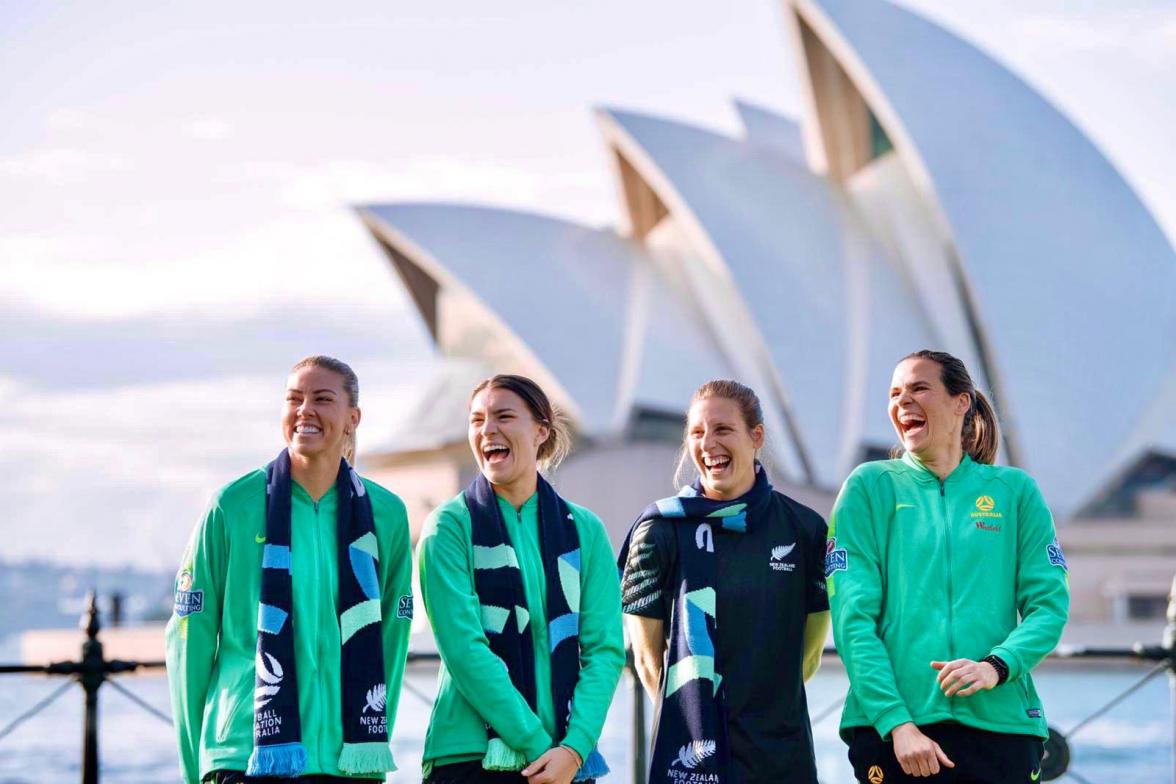 Group photo of several women infront of the Sydney Opera House.