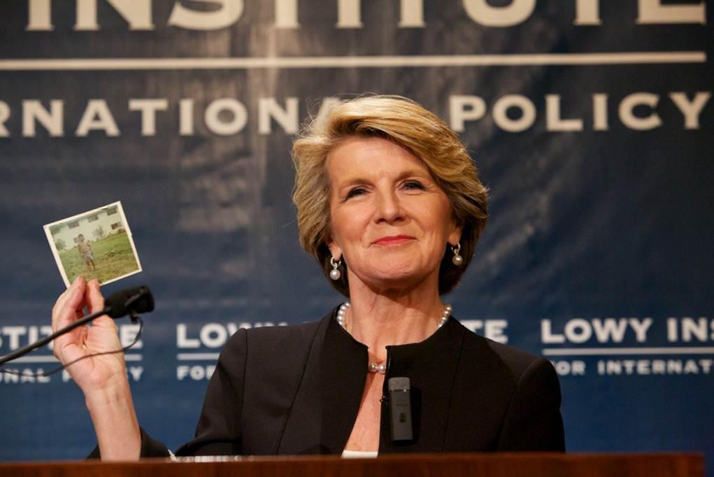 Foreign Minister Julie Bishop holds up a picture of her former Papua New Guinean pen pal, Oscar during a speech at the Lowy Institute. 26 November 2013.
Photo credit: Peter Morris, Sydney Heads