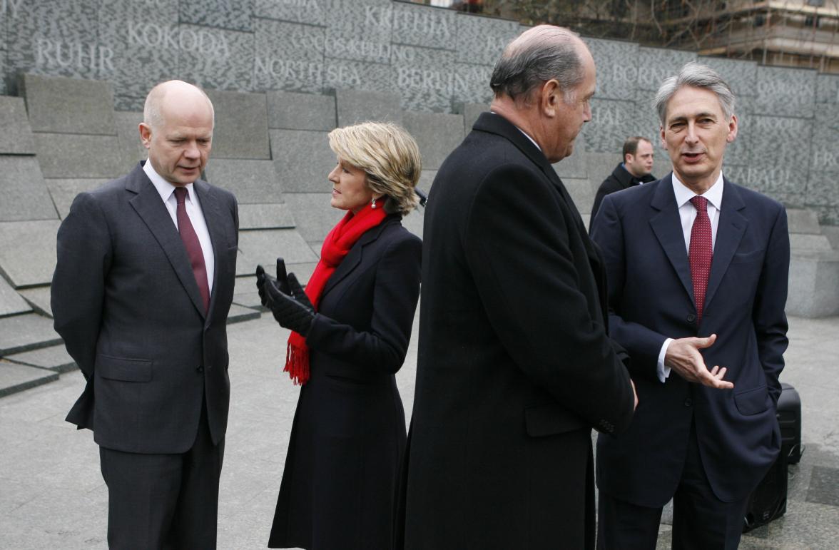 Wreath laying ceremony at the Australian War Memorial, Hyde Park Corner, London, on 11 March 2014, during AUKMIN. L to R UK Foreign Secretary William Hague; Foreign Minister Julie Bishop; Defence Minister David Johnston and UK Defence Secretary Philip Ham