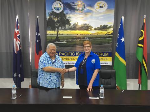 Australian Minister for Foreign Affairs, Senator the Hon Marise Payne shaking hands with the Prime Minister of Samoa, the Hon Tuilaepa Sailele Malielegaoi following the signing of two MoUs between Australia and Samoa on participating in the Pacific Medici