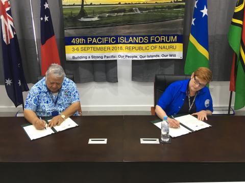 Australian Minister for Foreign Affairs, Senator the Hon Marise Payne and the Prime Minister of Samoa, the Hon Tuilaepa Sailele Malielegaoi signing two MoUs between Australia and Samoa on participating in the Pacific Medicines Testing Program and the Paci