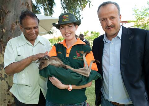 (L-R) Ebrahim Ismail Ebrahim, Deputy Minister of International Relations and Cooperation, South Africa and Fadhl Al-Maghafi, Minister Plenipotentiary, Yemen with a joey from Caversham Wildlife Park.

1 November 2013