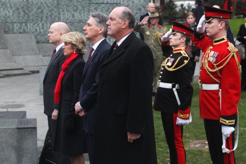 Wreath laying ceremony at the Australian War Memorial, Hyde Park Corner, London, on 11 March 2014, during AUKMIN. L to R UK Foreign Secretary William Hague; Foreign Minister Julie Bishop; UK Defence Secretary Philip Hammond and Defence Minister David John