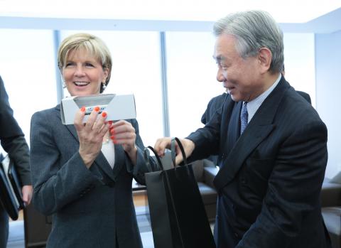 The Hon Julie Bishop MP, Minister for Foreign Affairs receives a model shinkansen (bullet train) from Mr Yoshiyuki Kasai, Honorary Chair, Central Japan Rail Company.