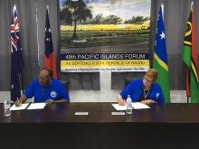 Australian Minister for Foreign Affairs, Senator the Hon Marise Payne and the Prime Minister of Vanuatu, the Hon Charlot Salwai Tabimasmas signing two MoUs between Australia and Vanuatu on participating in the Pacific Medicines Testing Program and the Pac