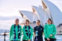 Group photo of several women infront of the Sydney Opera House.