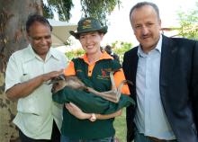 (L-R) Ebrahim Ismail Ebrahim, Deputy Minister of International Relations and Cooperation, South Africa and Fadhl Al-Maghafi, Minister Plenipotentiary, Yemen with a joey from Caversham Wildlife Park.

1 November 2013