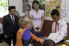 Foreign Minister Julie Bishop with H.E. Dr. Phankham Viphavanh, Lao minister of Education and Sports meeting  students at Hom Neua Primary School. Photo: Bart Verweij